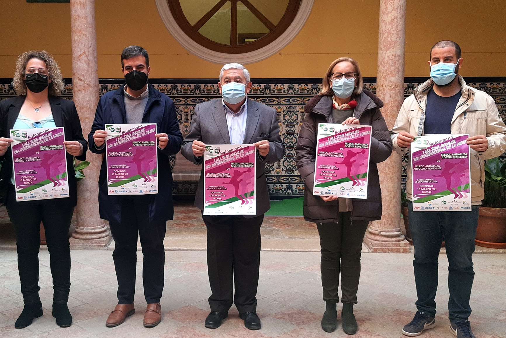 Representantes De La Federación Andaluza De Balonmano Y Autoridades Lojeñas Con El Cartel Del Evento